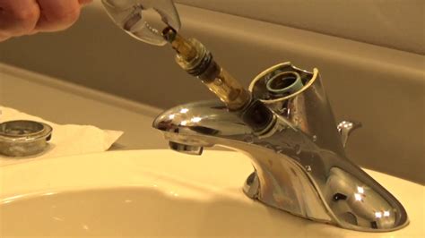 how to remove moen bathroom faucet handle|Step